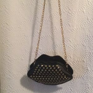 Black lip shaped studded purse